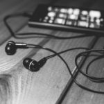 black-earphones-on-a-desk-6251