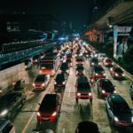 photo-of-vehicles-on-road-during-evening-1600757